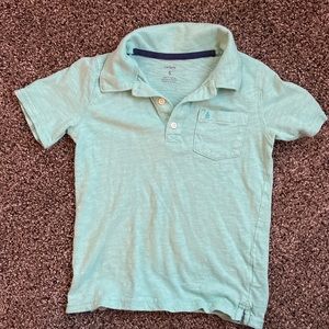 Boys short sleeve polo shirt .